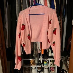 Pink cardigan with strawberries on the front and sleeves